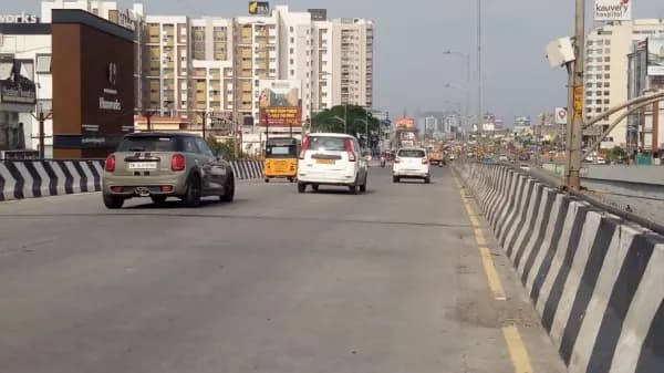 Hoarding - Radial road towards Velachery Palikaranai